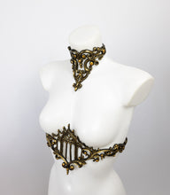 Load image into Gallery viewer, Choker necklace made from gold metallic latex to look like real metal. Composed of baroque style ornaments. Shown with a matching belt featuring a gothic cathedral window.