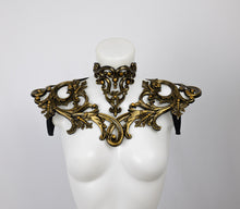 Load image into Gallery viewer, Choker necklace made from gold metallic latex to look like real metal. Composed of baroque style ornaments. Shown with a matching shoulder piece.
