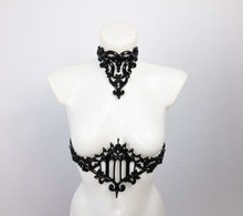 Load image into Gallery viewer, Choker necklace made from black sculpted latex. Composed of baroque style 3D ornaments. Shown with a matching belt featuring a gothic cathedral window.