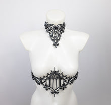 Load image into Gallery viewer, Choker necklace made from silver metallic latex to look like real metal. Shown with a matching belt featuring a gothic cathedral window.