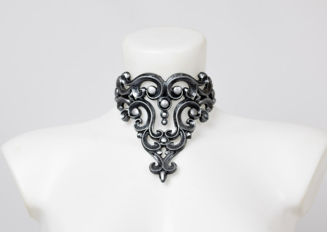 Choker necklace made from silver metallic latex to look like real metal.