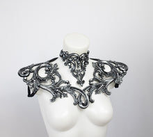 Load image into Gallery viewer, Choker necklace made from silver metallic latex to look like real metal. Shown with a matching shoulder piece.
